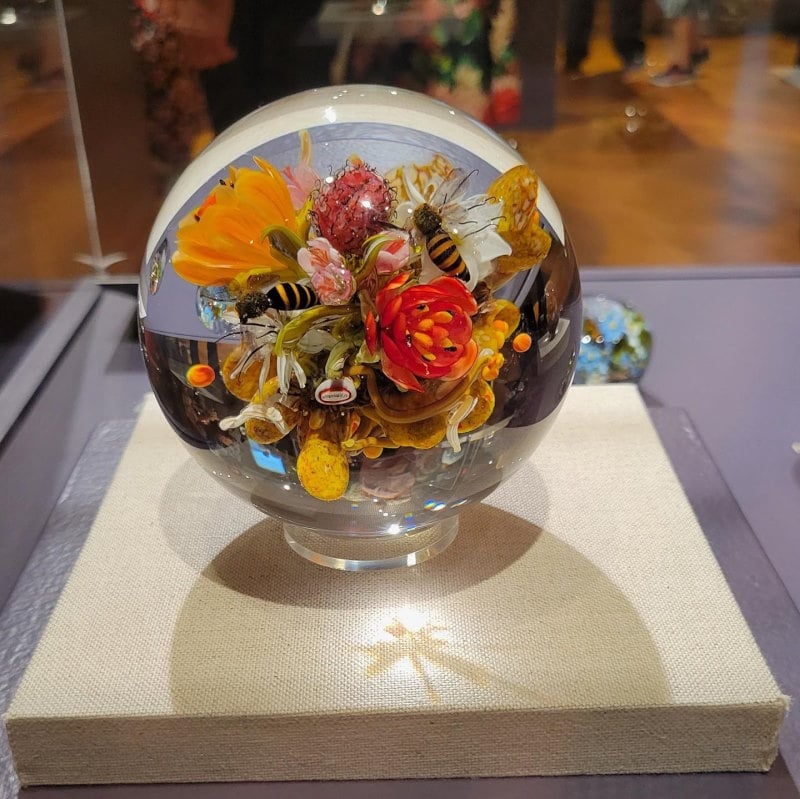 Image of a beautiful glass orb with flowers inside