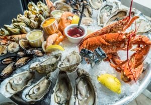 Image of an amazing seafood platter including muscles, lobster, shrimp clams and oysters,