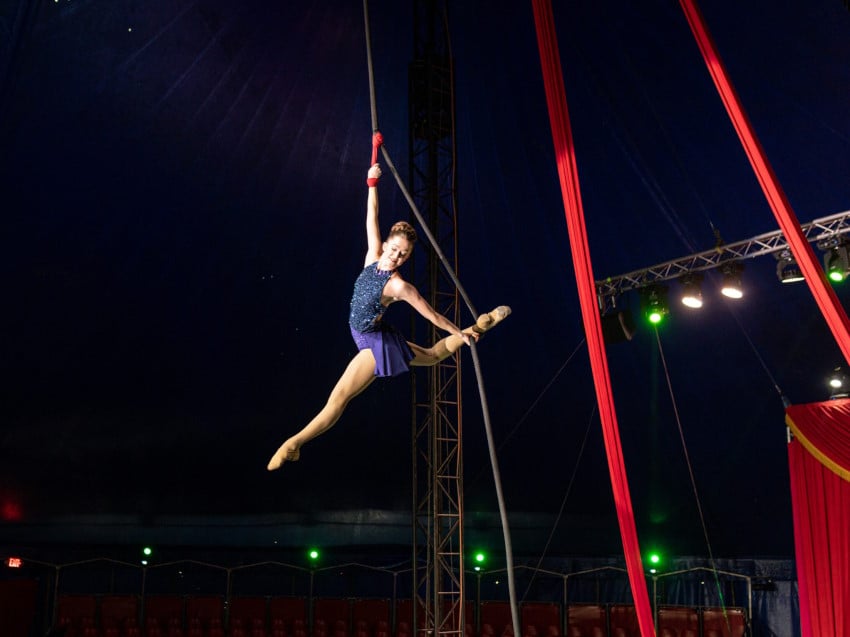 Woman hanging on a rope and spinning at the Do Portugal Circus